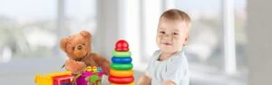 kind met speelgoed
